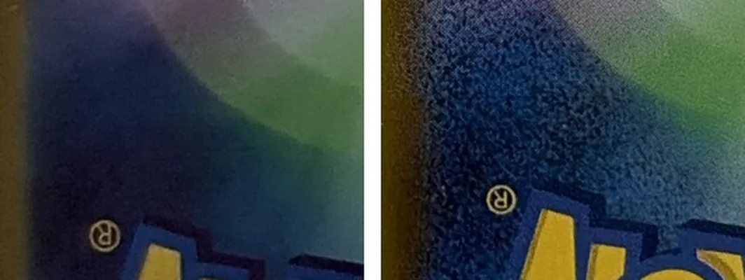 Close-up of the blue area of both Japanese backs: the counterfeit is completely smooth, the genuine card shows a dense speckled texture